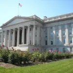 Exterior rear view of the neoclassical United States Department of the Treasury building in Washington DC