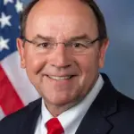 Official congressional portrait photograph of Wisconsin Representative Tom Tiffany in suit and tie