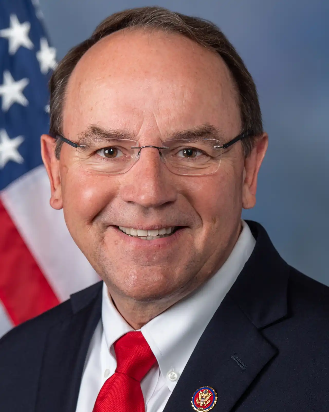 Official congressional portrait photograph of Wisconsin Representative Tom Tiffany in suit and tie
