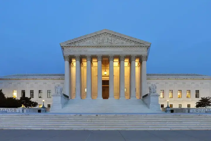 The Neoclassical marble portico and Corinthian columns of the Supreme Court of the United States in Washington, D.C.