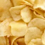 Potato chips representing a commonly consumed packaged snack food.
