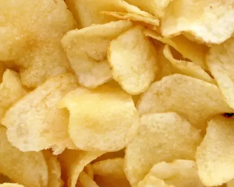 Potato chips representing a commonly consumed packaged snack food.