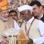 PMAY-G beneficiaries receiving keys to rural homes in India