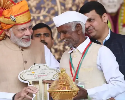 PMAY-G beneficiaries receiving keys to rural homes in India