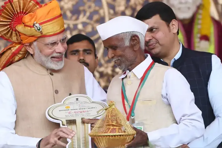 PMAY-G beneficiaries receiving keys to rural homes in India