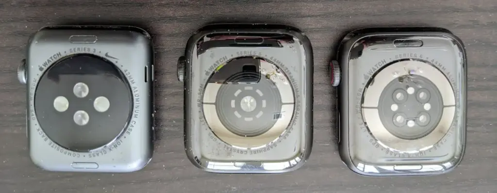 Close-up photograph of the back sensors on an Apple Watch without an active screen.