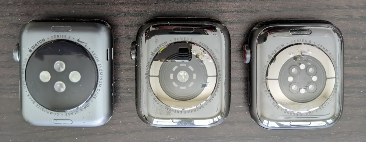 Close-up photograph of the back sensors on an Apple Watch without an active screen.