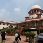 Exterior photograph of a court building complex in New Delhi.