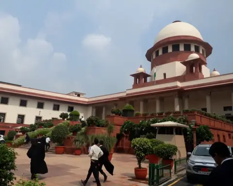Exterior photograph of a court building complex in New Delhi.