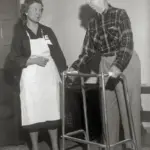Rehabilitation therapy session for an older man recovering from stroke.