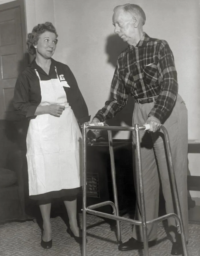 Rehabilitation therapy session for an older man recovering from stroke.