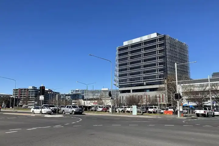 Street-level view of contemporary office buildings in Canberra Civic, the administrative centre of Australia's capital.