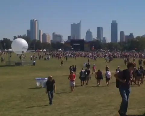 Austin City Limits festival crowd in a park setting