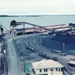 Coal stockpiles and export infrastructure at the Port of Gladstone in Queensland, Australia