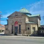 Stone facade and architectural columns of a Bank of Montreal branch building