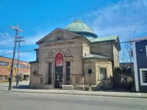 Stone facade and architectural columns of a Bank of Montreal branch building