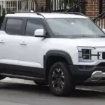 BYD Shark 6 plug-in hybrid pickup truck photographed outdoors