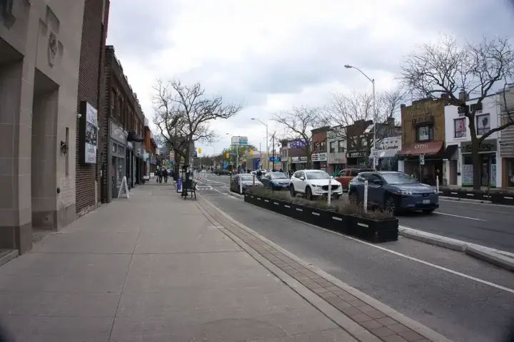 Storefronts and signage on a typical Canadian urban street