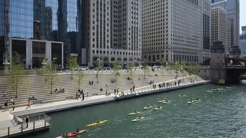 The pedestrian concourse along the Chicago Riverwalk beside the Chicago River in downtown Chicago.