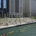 The pedestrian concourse along the Chicago Riverwalk beside the Chicago River in downtown Chicago.