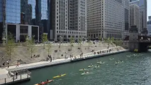 The pedestrian concourse along the Chicago Riverwalk beside the Chicago River in downtown Chicago.