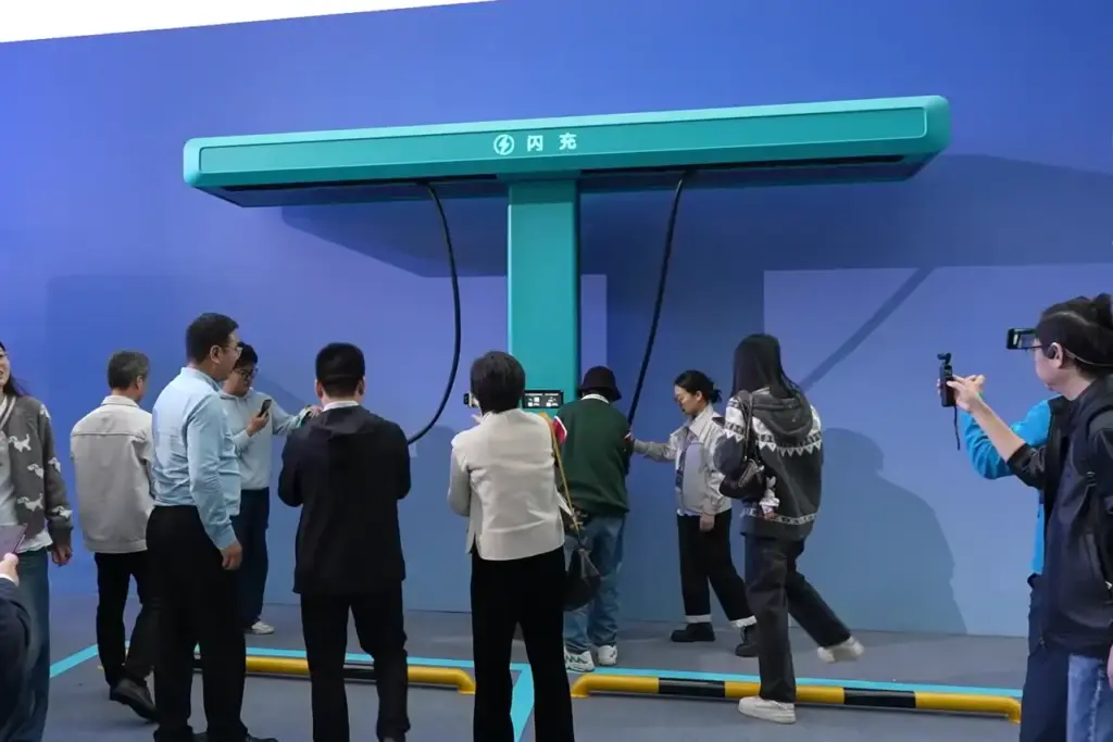 BYD flash charging station demonstration, representing China's rapid EV charging infrastructure expansion behind the 70% NEV target.