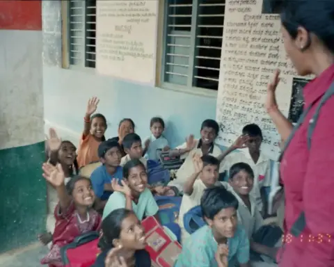 Indian classroom with students seated at desks during a lesson