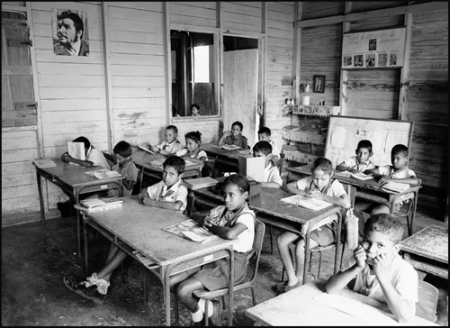 Cuban schoolchildren sitting in a classroom in Guantánamo province