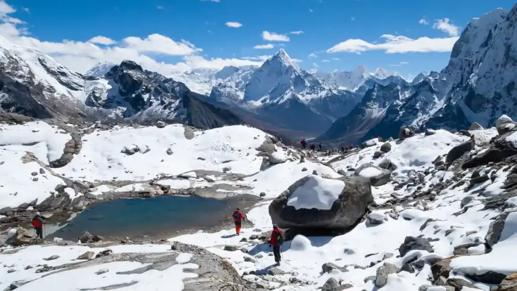 Snow-covered Himalayan mountains reflected in a mountain lake at Chola Valley Nepal