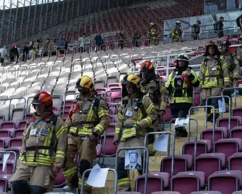 Firefighters climbing stairs during a 9/11 Memorial Stair Climb