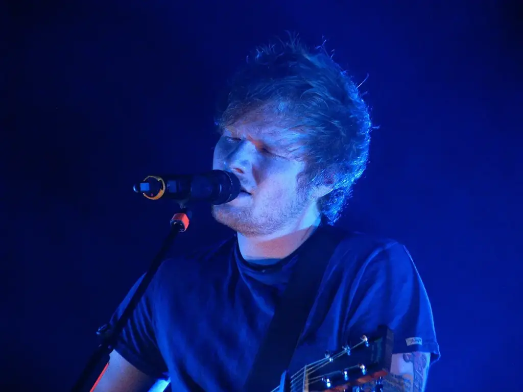 Ed Sheeran performing live on stage