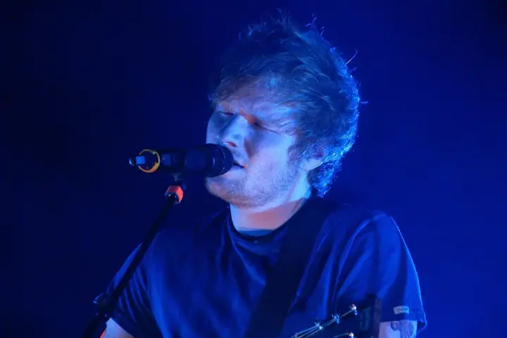 Ed Sheeran performing live on stage