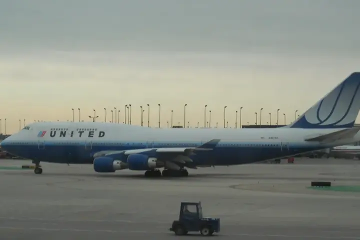 Boeing 747 aircraft on runway at Dubai International Airport