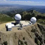 Panoramic photograph of the Francis Peak mountain ridgeline and communication towers in the Wasatch Range above Davis County, Utah, where a tornado touched down at 7,500 feet elevation.