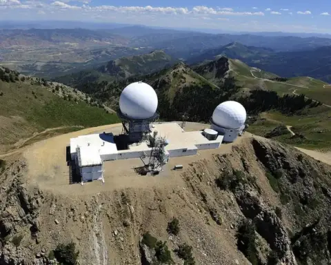Panoramic photograph of the Francis Peak mountain ridgeline and communication towers in the Wasatch Range above Davis County, Utah, where a tornado touched down at 7,500 feet elevation.