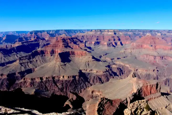 Panoramic view of the Grand Canyon South Rim, the landmark landscape affected by flash flooding that recently yielded human remains near Crystal Rapids.
