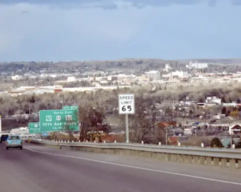 Overview of the city of Great Falls, Montana, showing residential neighborhoods, commercial structures, and the Missouri River corridor.