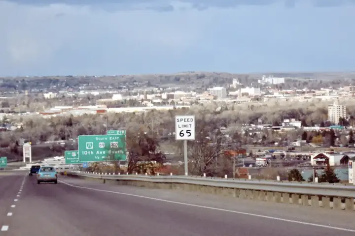Overview of the city of Great Falls, Montana, showing residential neighborhoods, commercial structures, and the Missouri River corridor.