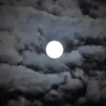 Harvest Moon rising in the night sky