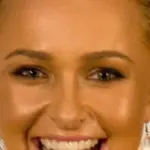 Hayden Panettiere smiling at Fan Expo Toronto in 2011, cropped from a licensed event photograph.