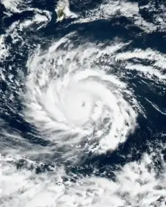 Satellite view of Hurricane Lowell’s spiral cloud bands over the Pacific Ocean.