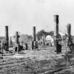 Exterior of a damaged building with conflict-related structural damage