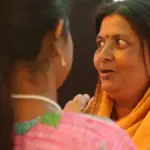 Indian women speaking in a community setting