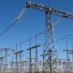 High-voltage electrical substation switchgear and power transmission infrastructure connecting regional power lines