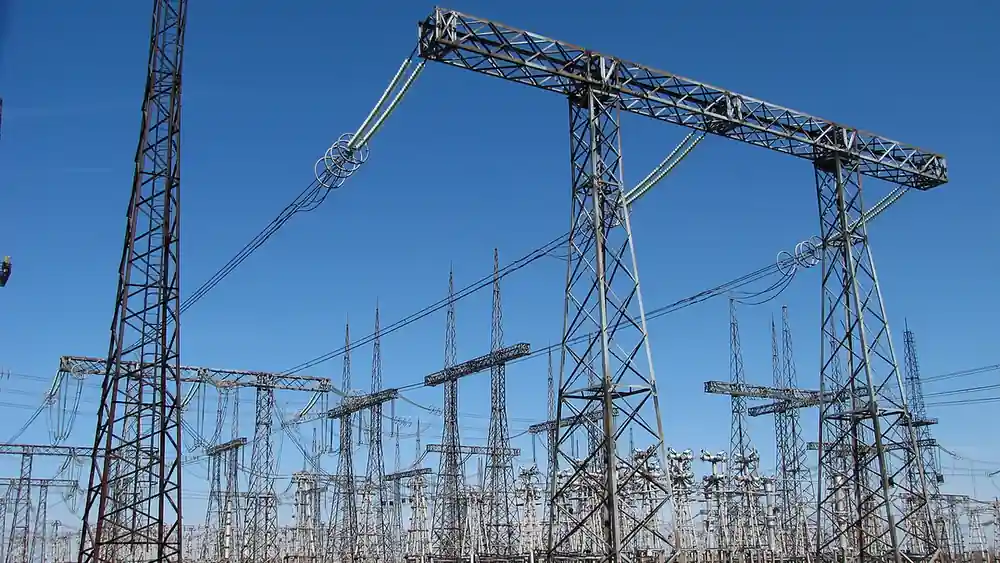 High-voltage electrical substation switchgear and power transmission infrastructure connecting regional power lines