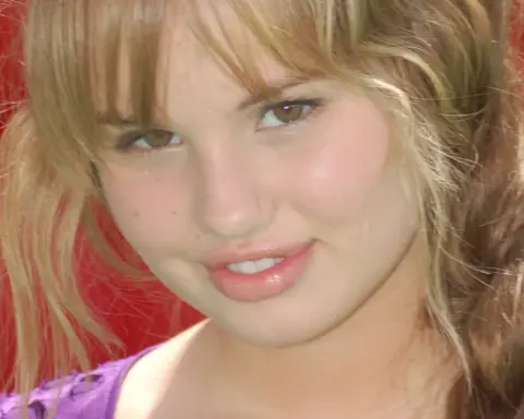 Debby Ryan posing at a public event in May 2009