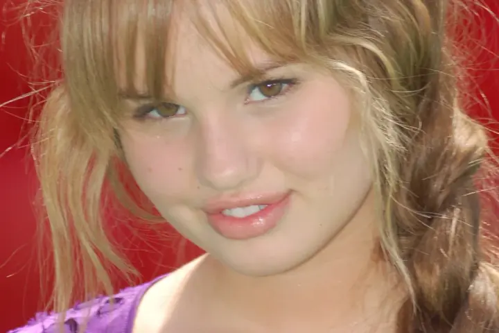 Debby Ryan posing at a public event in May 2009
