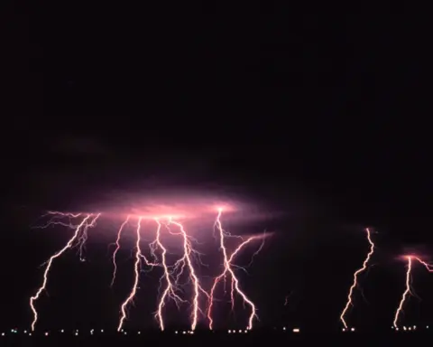 Cloud-to-ground lightning during a nighttime thunderstorm