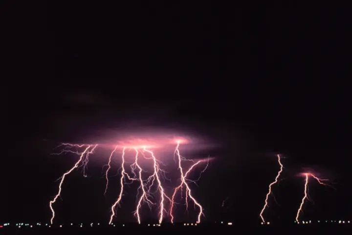 Cloud-to-ground lightning during a nighttime thunderstorm