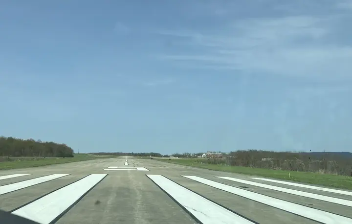 Airport runway with aircraft on tarmac